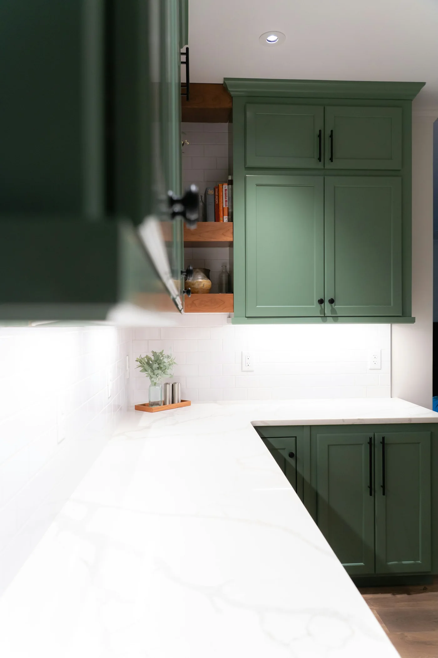 Interior inspiration: green cabinetry and a pale stone countertop