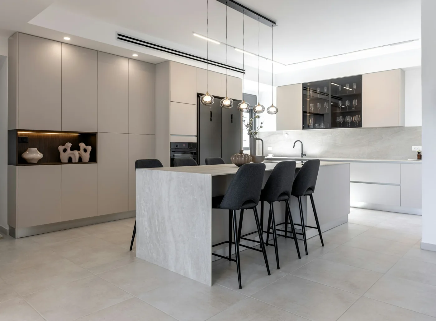 Contemporary kitchen design inspiration with an island and light cabinetry